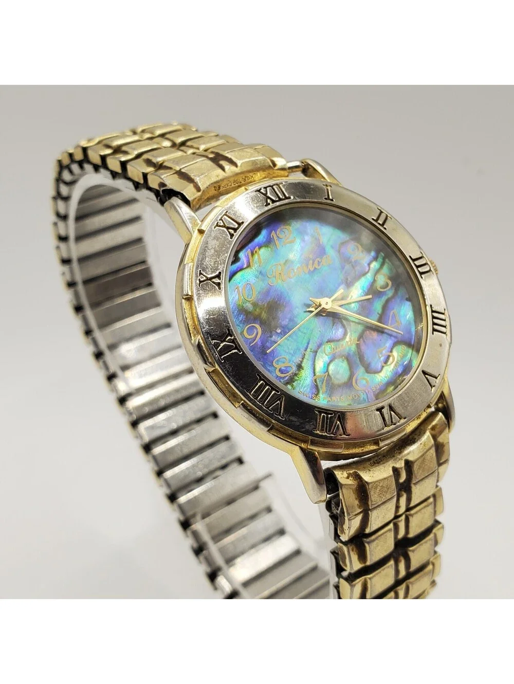 Ronica Watch Women 33mm Abalone MOP Dial Gold Tone Stretch Band New Battery